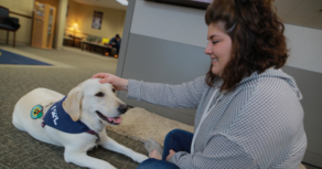 Student with therapy dog
